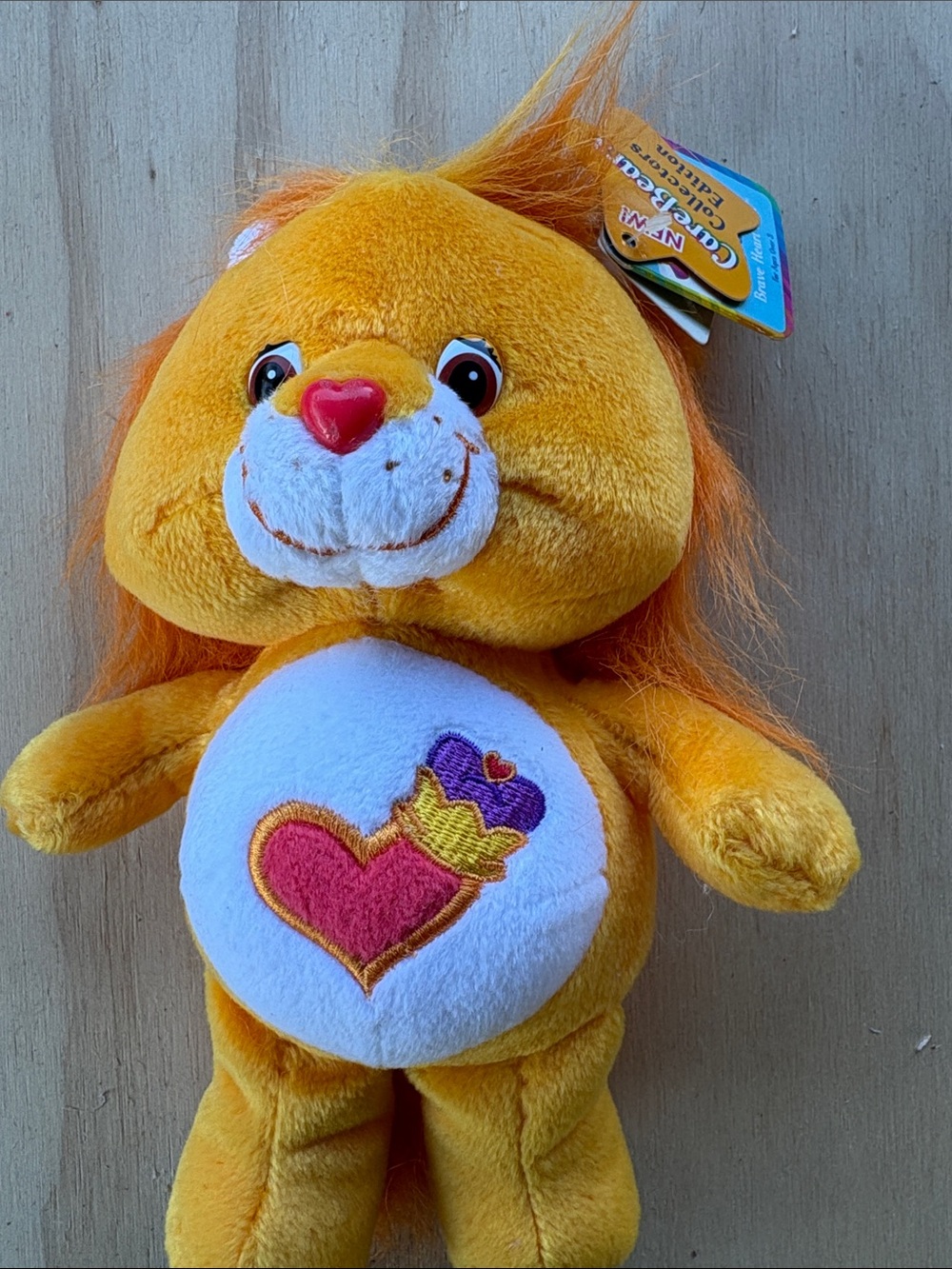 Orange Plush Lion Kids Toy with Heart Emblem